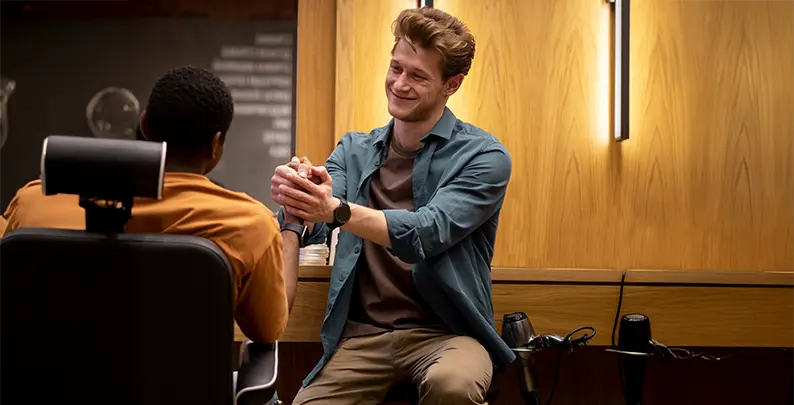 Game studio lead welcoming a new developer to the team 